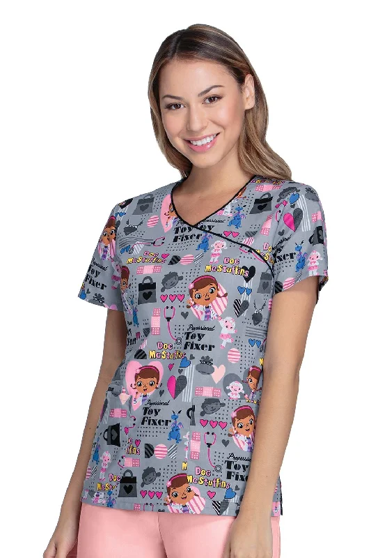 Trendy And Casual Cherokee Tooniforms Women's Mock Wrap Toy Fixer Print Scrub Top XXX-Large Print